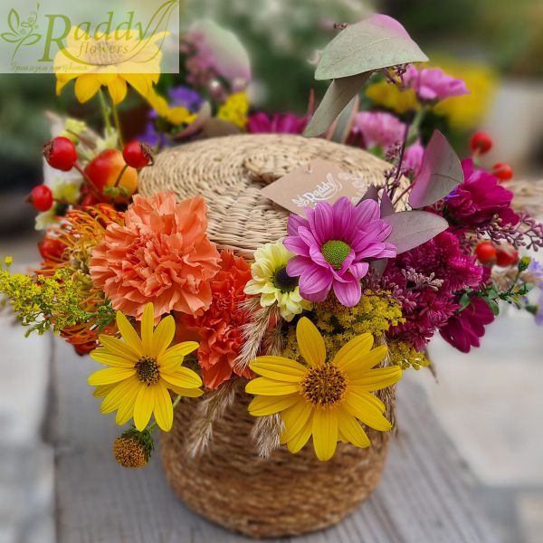 Country-style Аутумн basket flower arrangement