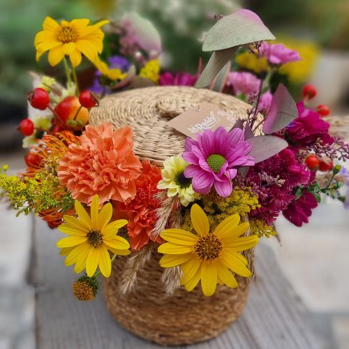 Country-style Аутумн basket flower arrangement